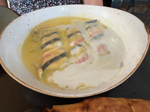 up close tricolor lemon ricotta ravioli 