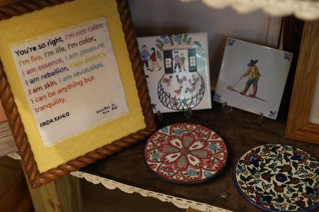 tile and framed quotes in boutique