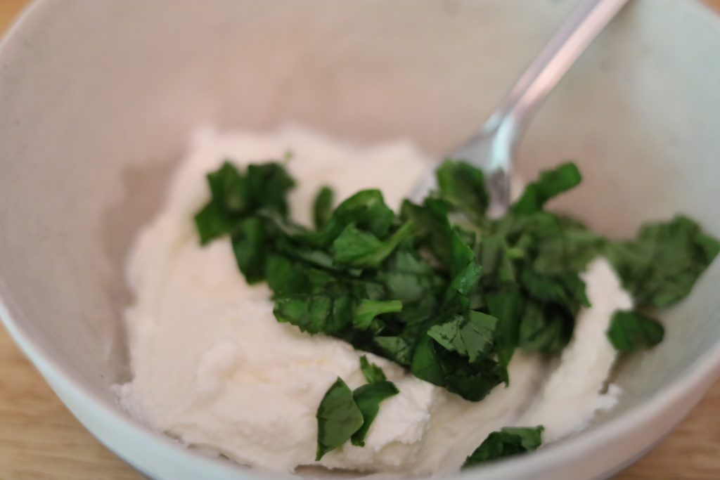 ricotta and basil in bowl